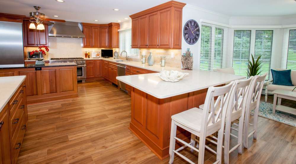 wood kitchen cabinets with wood floors