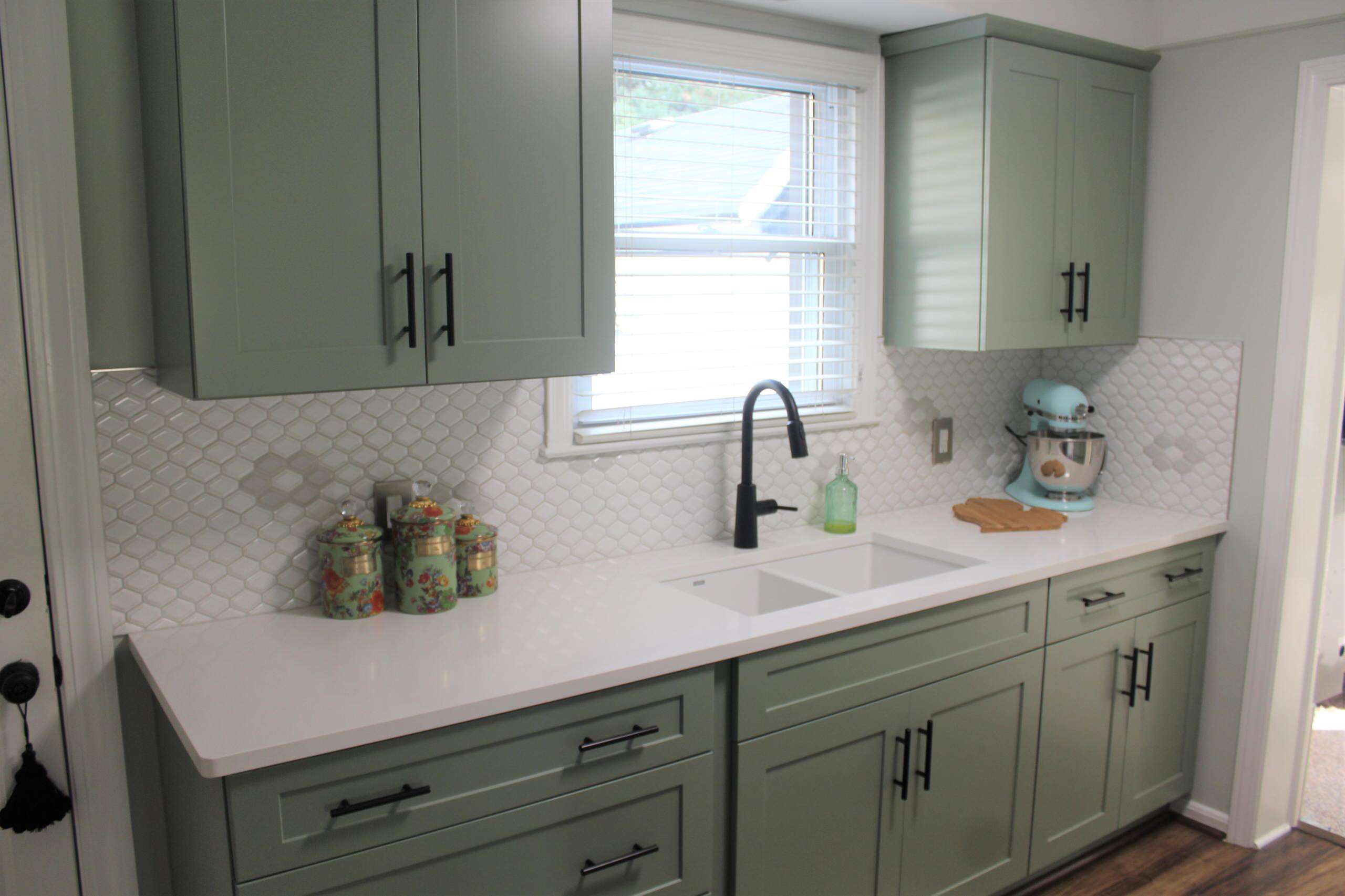 Green Kitchen Cabinets with Black Hardware: A Natural Pairing