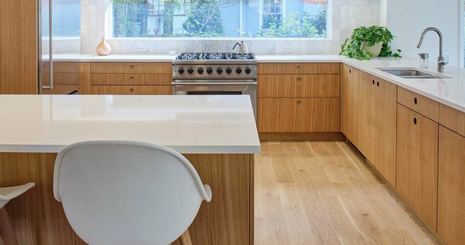 Kitchen With Wood Cabinets And White Countertops