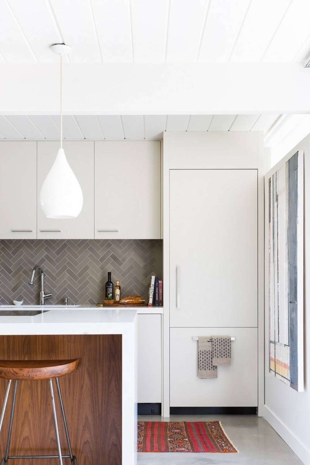 White Kitchen Cabinets With Herringbone Backsplash