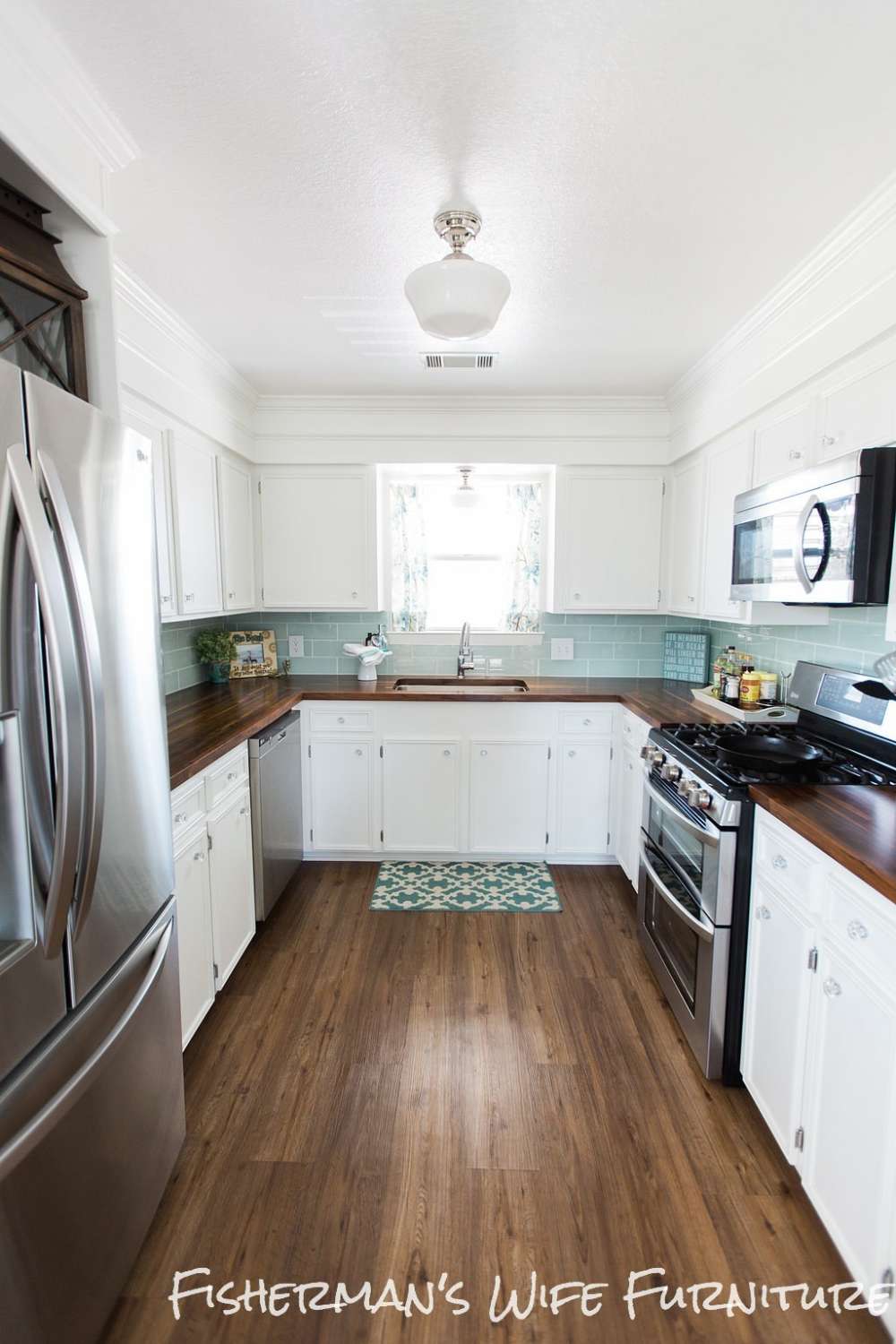 white cabinets with butcher block countertops